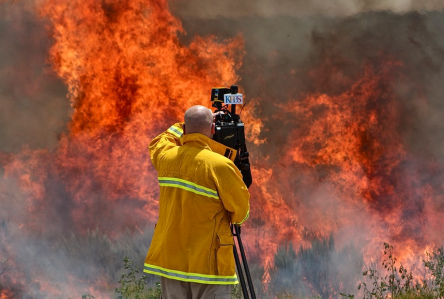 KPBS videographer Christopher Maue shoots near the Vallecito Lightning Complex wildfires on August 15, 2012. Photo courtesy of KPBS News.